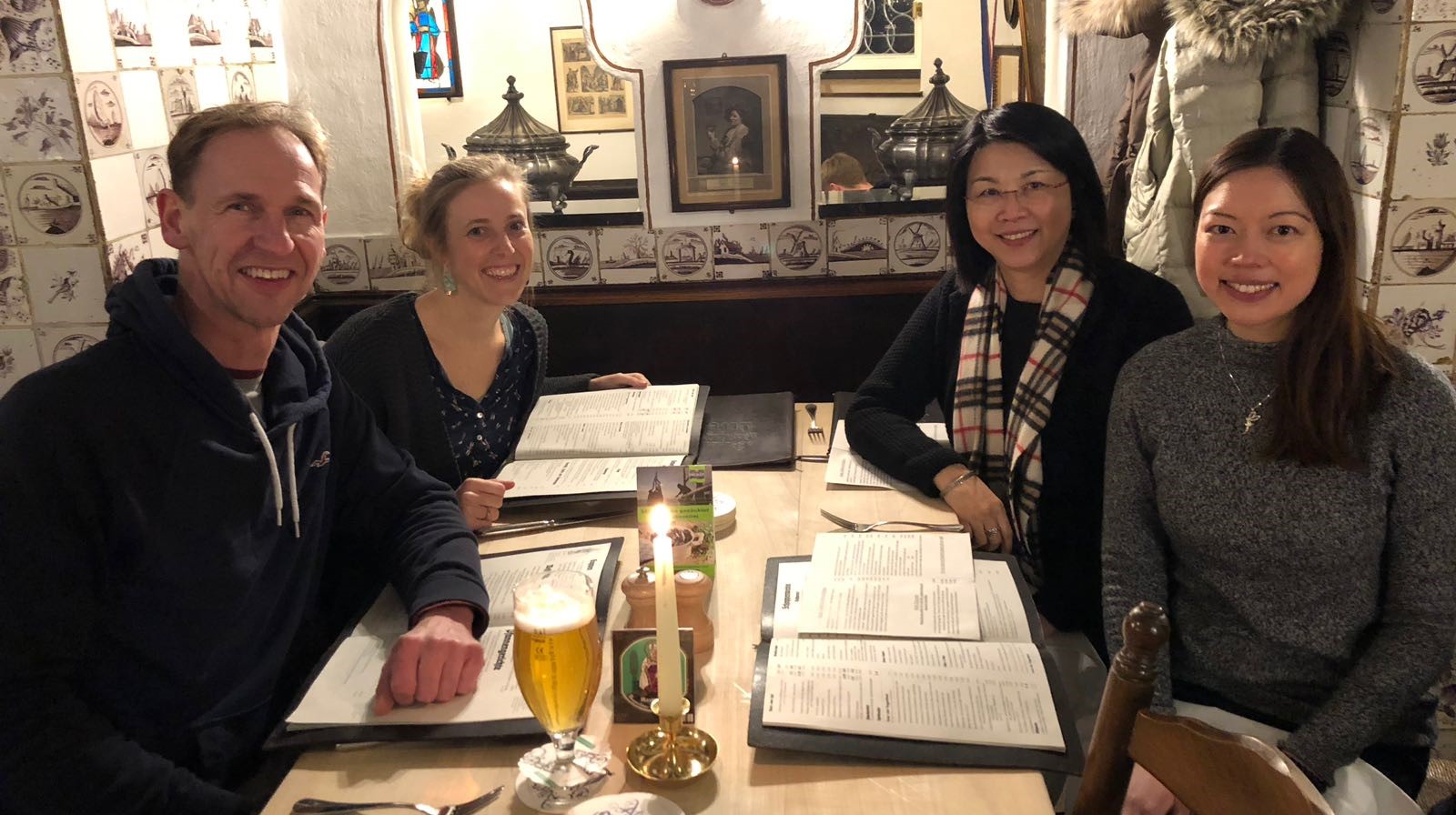 Dr. Lam (right) with Professor Tatia Lee (second from right), supervisor at HKU, and associates