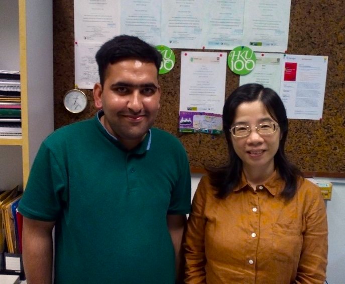 Muhammad Shujahat (left) and Professor Maggie Minhong Wang