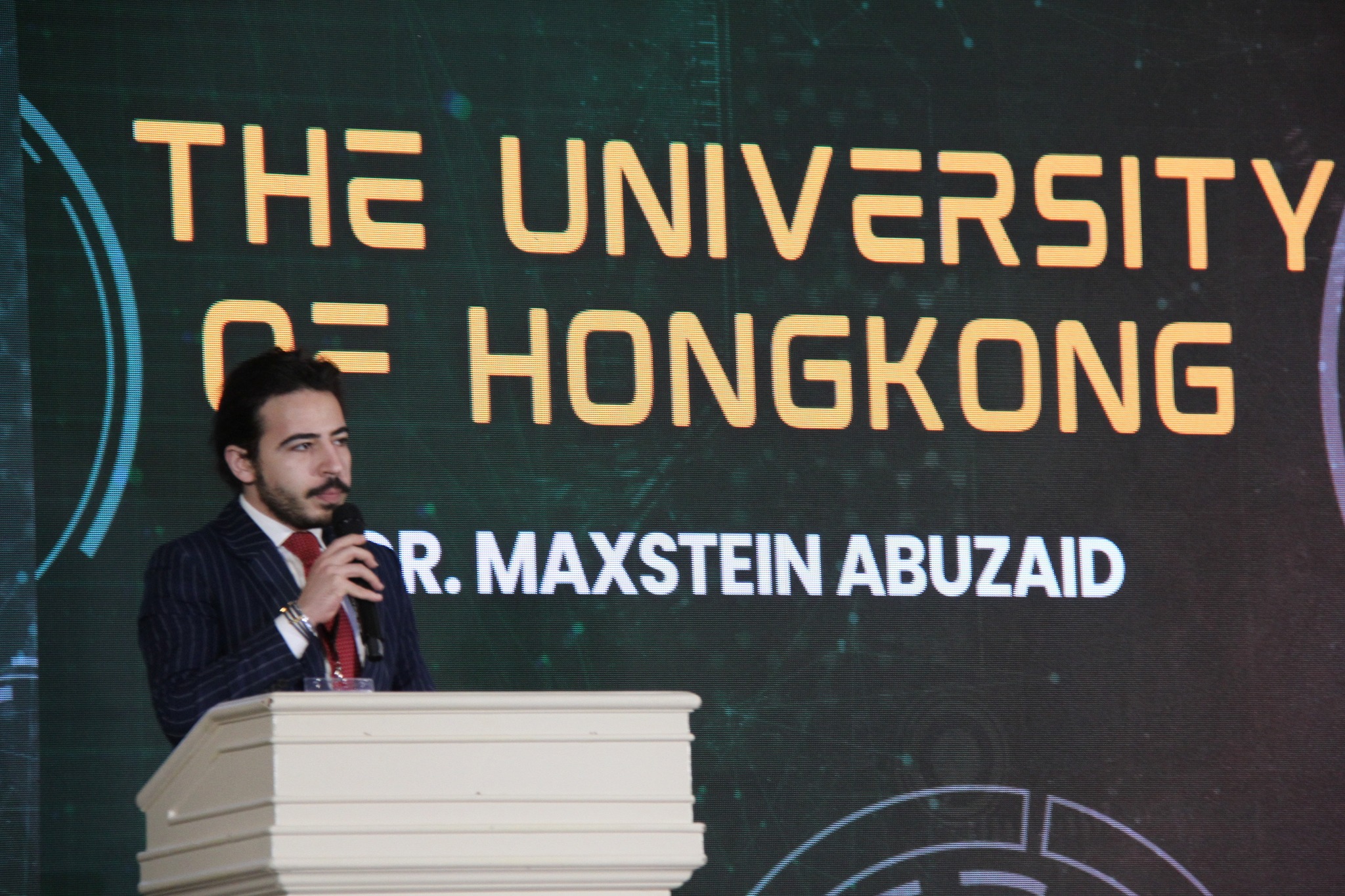 Dr Maxstein Mostafa Abuzaid giving a lecture at the UP College of Dentistry International Oral Health Symposium in Manila.
