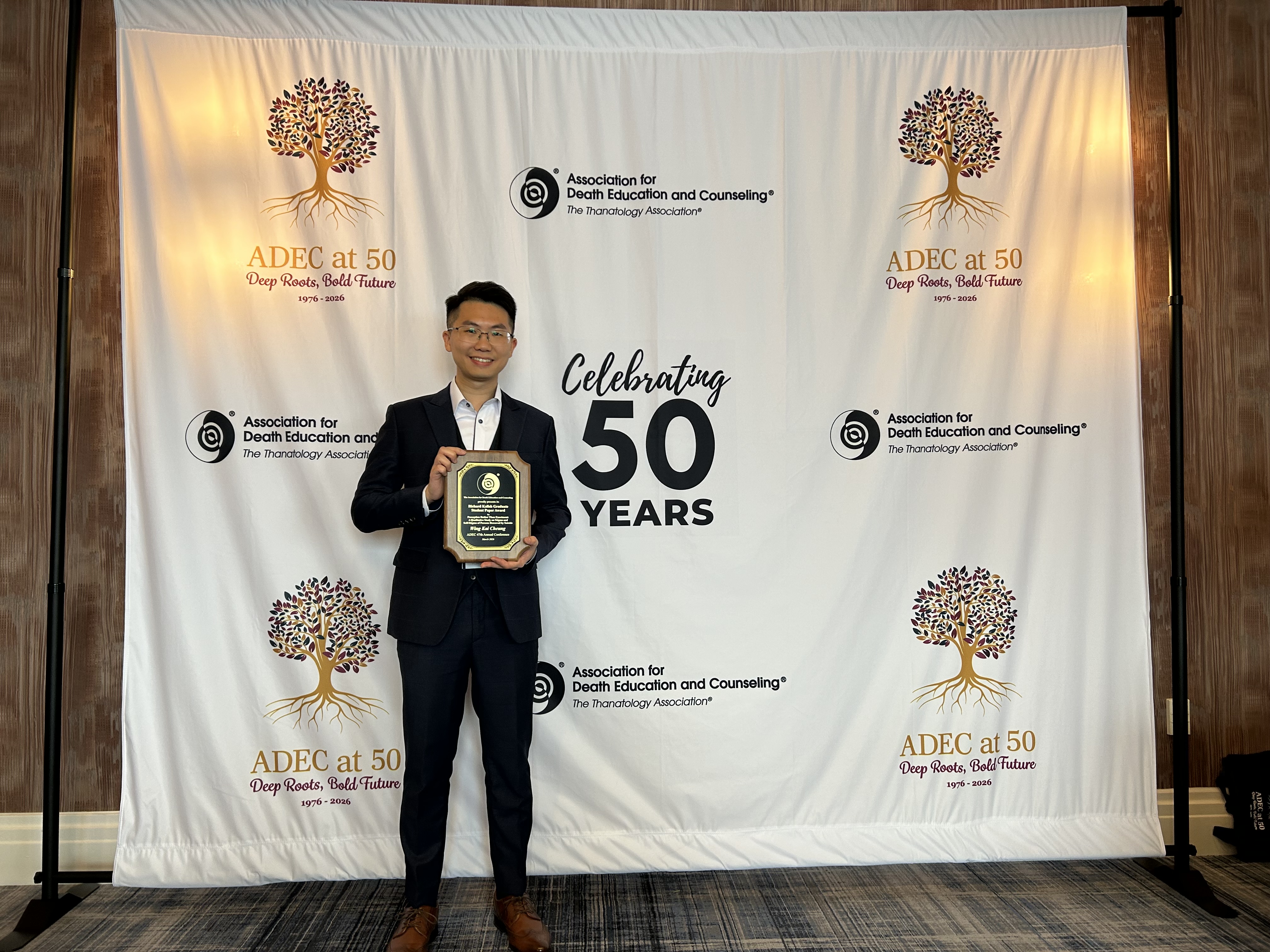 Wing Kai Cheung receiving the award at the ADEC 2026 Annual Conference.